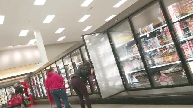 Candid 18 Adolescent In Maroon Leggings Shopping